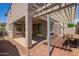 Backyard patio with pergola enhances outdoor enjoyment, perfect for dining or relaxing under shade at 12041 W Fillmore St, Avondale, AZ 85323