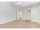 Bedroom with carpet, closet, and light blue walls, providing a blank canvas for personalization at 12041 W Fillmore St, Avondale, AZ 85323