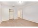 Bedroom with carpet, closet, and neutral walls, providing a blank canvas for personalization at 12041 W Fillmore St, Avondale, AZ 85323