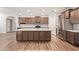 Spacious kitchen featuring a large island, stainless appliances, and open design at 12041 W Fillmore St, Avondale, AZ 85323