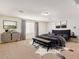 Elegant main bedroom with bench seat, designer accents, and large windows at 12041 W Fillmore St, Avondale, AZ 85323