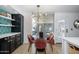 Bright kitchen with black and white cabinets, a view through the large patio door, and stylish accents at 1225 E Medlock Dr # 206, Phoenix, AZ 85014