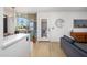 Bright living space featuring patio access, stylish tile floors, and contemporary decor at 1225 E Medlock Dr # 206, Phoenix, AZ 85014