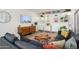 Inviting living room features stylish built-ins, ample lighting, and a comfortable, contemporary design at 1225 E Medlock Dr # 206, Phoenix, AZ 85014