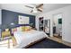 Comfortable primary bedroom includes closet space and a modern ensuite bathroom at 1225 E Medlock Dr # 206, Phoenix, AZ 85014