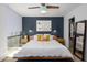 Relaxing primary bedroom features stylish wall color, and a light and airy feel at 1225 E Medlock Dr # 206, Phoenix, AZ 85014