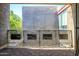 Private outdoor patio space featuring brick walls and wrought-iron accents at 1225 E Medlock Dr # 206, Phoenix, AZ 85014