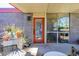 Cozy patio with outdoor seating, potted plants, and a view of palm trees at 1225 E Medlock Dr # 206, Phoenix, AZ 85014