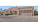Charming single-story home featuring a well-manicured yard and attached two-car garage, set in a suburban neighborhood at 12730 N 90Th Way, Scottsdale, AZ 85260