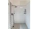 Shower featuring modern fixtures, a rainfall showerhead, a tiled backsplash, and a glass enclosure at 12730 N 90Th Way, Scottsdale, AZ 85260