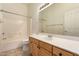 Full bathroom featuring a vanity, sink, tile flooring, and shower over tub with tile surround at 13368 W Rimrock St, Surprise, AZ 85374