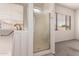 Bathroom featuring a walk-in tub and tiled walk-in shower at 13368 W Rimrock St, Surprise, AZ 85374