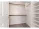 Spacious walk-in closet with ample shelving and hanging space, providing optimal organization at 13368 W Rimrock St, Surprise, AZ 85374