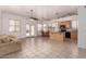 Open-concept layout connects the living room, dining area, and functional kitchen space at 13368 W Rimrock St, Surprise, AZ 85374