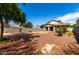 Spacious backyard with a rock landscape and patio at 13602 N 149Th Ave, Surprise, AZ 85379