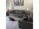 Comfortable living room showcasing plush couches, glass coffee table, and modern decor at 14145 N 92Nd St # 2011, Scottsdale, AZ 85260