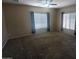 Cozy bedroom with dual windows, plush carpet, and neutral paint, creating a relaxing space at 14841 W Desert Hills Dr, Surprise, AZ 85379