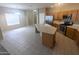 Well-lit kitchen featuring a central island, stainless steel appliances, and generous counter space at 14841 W Desert Hills Dr, Surprise, AZ 85379