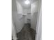 Spacious walk-in closet with ample shelving provides plenty of storage space at 14841 W Desert Hills Dr, Surprise, AZ 85379