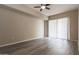 Spacious bedroom with a sliding glass door and ample natural light at 16 W Encanto Blvd # 110, Phoenix, AZ 85003