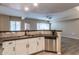 Modern kitchen featuring stainless steel appliances, sleek countertops, and seamless flow to the living space at 16 W Encanto Blvd # 110, Phoenix, AZ 85003