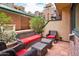 Outdoor patio space with comfortable seating and views of the building and landscaping at 16 W Encanto Blvd # 110, Phoenix, AZ 85003