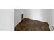Tiled laundry room featuring a pet door access at 18148 W Lundberg St, Surprise, AZ 85388