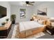 Inviting main bedroom featuring neutral tones, contemporary furnishings, and a calming atmosphere for relaxation at 18148 W Lundberg St, Surprise, AZ 85388