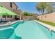 Refreshing backyard pool with patio area, ideal for outdoor gatherings and relaxation at 18542 W Valerie Dr, Surprise, AZ 85374