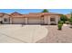 Charming home with a two-car garage and a well-maintained, expansive driveway at 2055 N 56Th St # 15, Mesa, AZ 85215