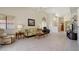 Spacious living room featuring vaulted ceilings, tile floors and large windows at 2055 N 56Th St # 15, Mesa, AZ 85215