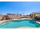 Sparkling community pool with inviting lounge area and mature landscaping at 2055 N 56Th St # 15, Mesa, AZ 85215