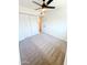 Bedroom features a ceiling fan and double door closet at 225 N Standage -- # 45, Mesa, AZ 85201