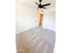 Comfortable carpeted bedroom with ceiling fan, and double door closet at 225 N Standage -- # 45, Mesa, AZ 85201