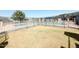 Community pool with sunshades, enclosed with black metal fencing at 225 N Standage -- # 45, Mesa, AZ 85201