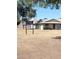 Community sign view showing residential homes in a landscaped setting at 225 N Standage -- # 45, Mesa, AZ 85201