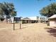 Community sign view showing residential homes in a landscaped setting at 225 N Standage -- # 45, Mesa, AZ 85201