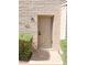 Inviting front door with stylish hardware and manicured landscaping at 225 N Standage -- # 45, Mesa, AZ 85201