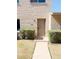 Inviting front door with stylish hardware and manicured landscaping at 225 N Standage -- # 45, Mesa, AZ 85201