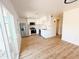 Bright open-concept kitchen with stainless steel appliances and white cabinets at 225 N Standage -- # 45, Mesa, AZ 85201