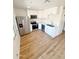 An open kitchen features stainless steel appliances, modern cabinets and plenty of countertop space at 225 N Standage -- # 45, Mesa, AZ 85201