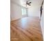 Bright living room with a ceiling fan, window, and light wood flooring at 225 N Standage -- # 45, Mesa, AZ 85201