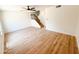 Open living area showcases staircase, ceiling fan, and light, modern finishes throughout at 225 N Standage -- # 45, Mesa, AZ 85201