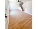 Open living room with new floors and large windows offering plenty of natural light at 225 N Standage -- # 45, Mesa, AZ 85201