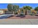 Charming home with well-maintained landscaping and desert-friendly rock groundcover at 23317 N Arrellaga Dr, Sun City West, AZ 85375