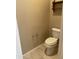 Toilet room with a standard toilet and minimal accessories at 23317 N Arrellaga Dr, Sun City West, AZ 85375