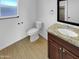 The bathroom features tile flooring, granite countertops, and vanity storage space at 2614 E Obregon St, Tempe, AZ 85288
