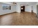 Inviting open-plan living room and kitchen area with wood-look floors at 2614 E Obregon St, Tempe, AZ 85288