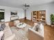 Bright living room featuring hardwood floors, modern furniture, and stylish decor elements at 2614 E Obregon St, Tempe, AZ 85288