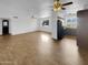 Open-concept living room and kitchen area with wood-look floors and ample space at 2614 E Obregon St, Tempe, AZ 85288
